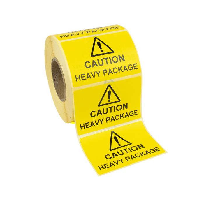 75mm x 50mm Caution Heavy Package Labels/Stickers. Yellow Labels, Black Print. Strong Permanent Adhesive. 500 per roll.